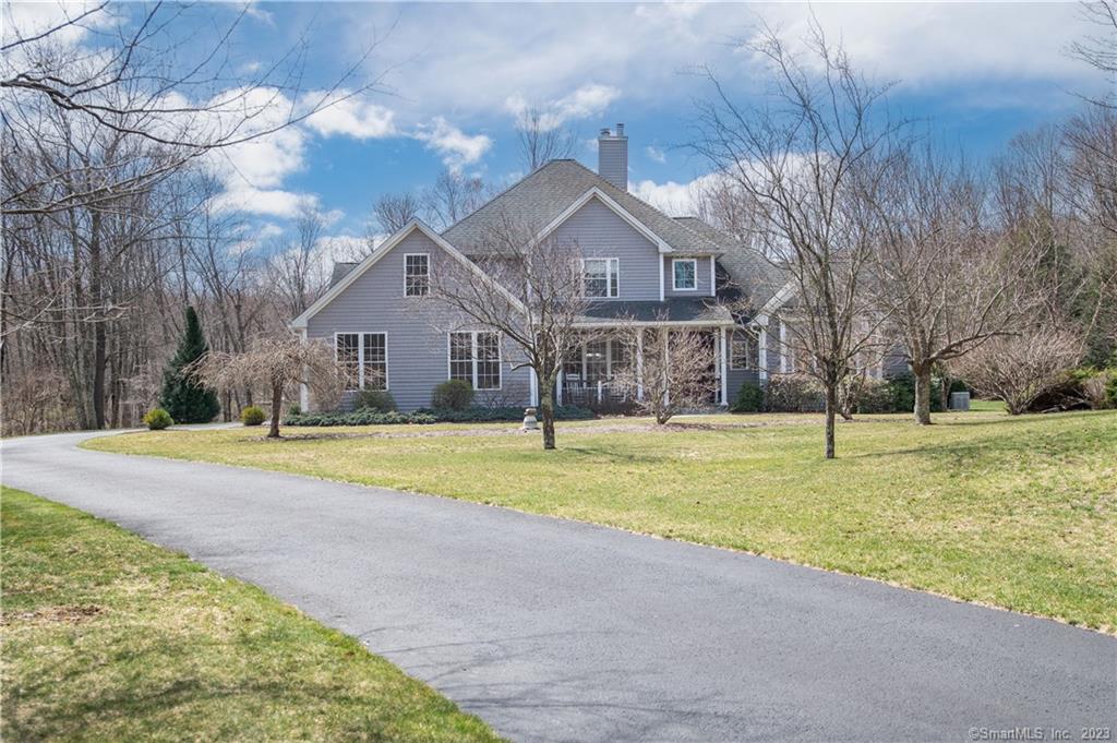 Welcome home to this beautiful custom built Colonial tucked away on a cul-de-sac road. Pride of ownership is apparent with the flat, park-like manicured lawn nearby the Hesseky Brook and the conservation land sights and sounds of wildlife surrounding it. Be wowed by the fine custom features including hardwood floors, crown molding, transom door frames, coffered ceilings, french doors and more. The home is flooded with natural light from the walls of windows overlooking the tranquil backyard. This cheerful home has an easy flow floor plan with wide doorways and thoughtfully laid out rooms. The open space Kitchen opens up to the sunroom a perfect space for relaxing and conversing. Main level primary Bedroom has private doors to the deck, a dressing room, full bath with tiled shower, jetted tub and a huge walk-in-closet. Main level office is perfect for the remote worker. Upstairs has 3 Bedrooms and was previously used as an in-law suite. Great potential for multi-generational living. You will be amazed at the impeccable care of this home including the full basement which has so much space! The home is also wired with an automatic whole house Generac generator run by propane for peace of mind if there is ever power loss. Located on 3 plus acres the exterior provides ease in outdoor living including a new Trex deck with an awning and covered space to enjoy spending time outdoors. Super location close to both Southbury and Woodbury shops, dining and commuting routes.