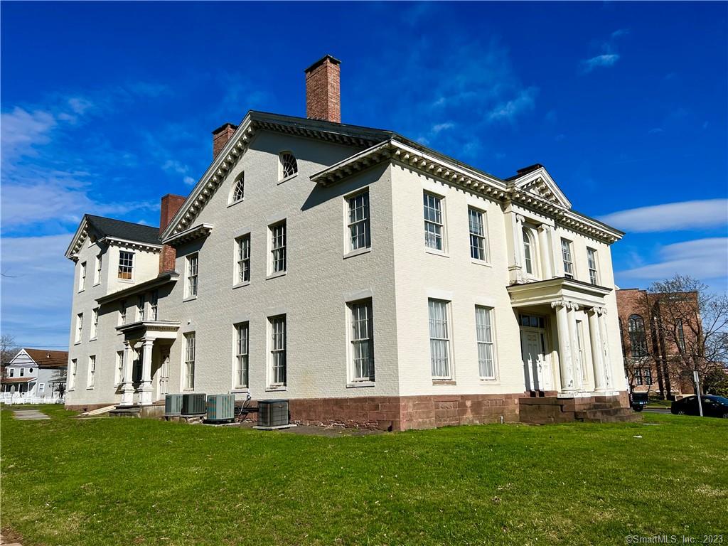 Looking to relocate your business or medical practice to the historic Mather's House that overlooks South Green and in the heart of Middletown? This 3, 100 sq ft 2nd floor location has so much to offer you and your clients. You will notice the charm and architectural detailing of this building as soon as you enter and view the grand staircase. As you make your way to the 2nd floor you will enter through double doors where you will find multiple office/exam rooms, 4 half bathrooms, a 2nd staircase, a storage area, a waiting room plus so much more. There is a large, attached parking lot for your convenience.