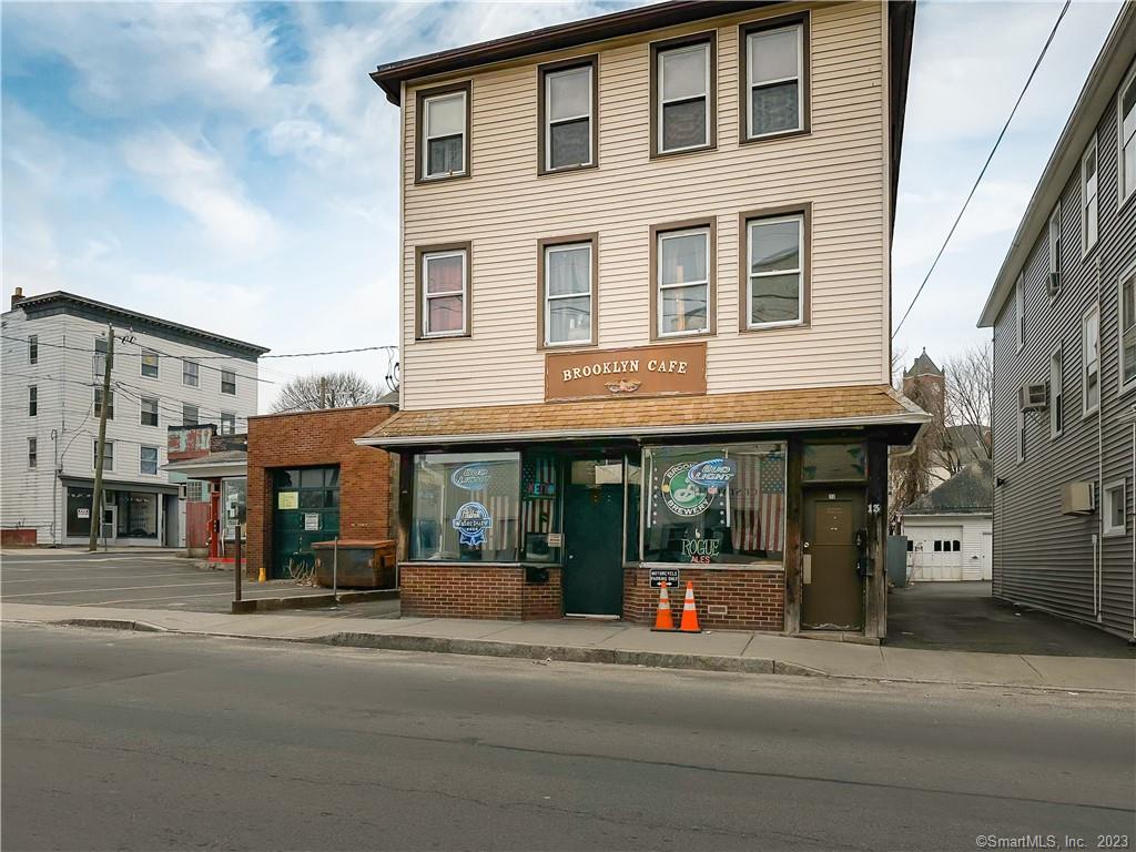 Turn-key and long established bar/tavern with a commercial kitchen setup, located in Waterbury's Brooklyn Center! Currently operating as Brooklyn Cafe and features a historic wooden bar, high ceilings, central AC, tons of seating and an iconic atmosphere. This is an excellent oppurtunity for a succesful business that cash flows. This is a business only sale.