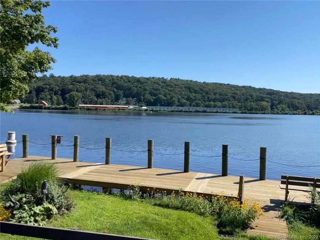 Gorgeous, rare waterfront property! Features a 45 foot deep water dock built in 2020 that is sure to impress boating enthusiasts. Beautiful views of the serene Connecticut River, Goodspeed Opera House, Swing Bridge and much more. Seating on the dock allows you to watch the sea planes in your backyard, dine outdoors on the water, have a cocktail watching the sunset or just sit and have morning coffee. Convenient outdoor shower after a day on the water and many attached sheds for storage. Enjoy a relaxing evening in the hot tub while watching the boats pass. Inside features a beautifully renovated 2 bedroom ranch with one full bathroom. The cozy rustic living room has hardwood floors, a wood burning fireplace and even a gorgeous wood ceiling. The completely remodeled open kitchen has quartz counters, stainless steel appliances and unobstructed views of the water. There are breathtaking views from every room in this home. Don't miss this opportunity to own direct waterfront in one of the most beautiful areas of Connecticut.