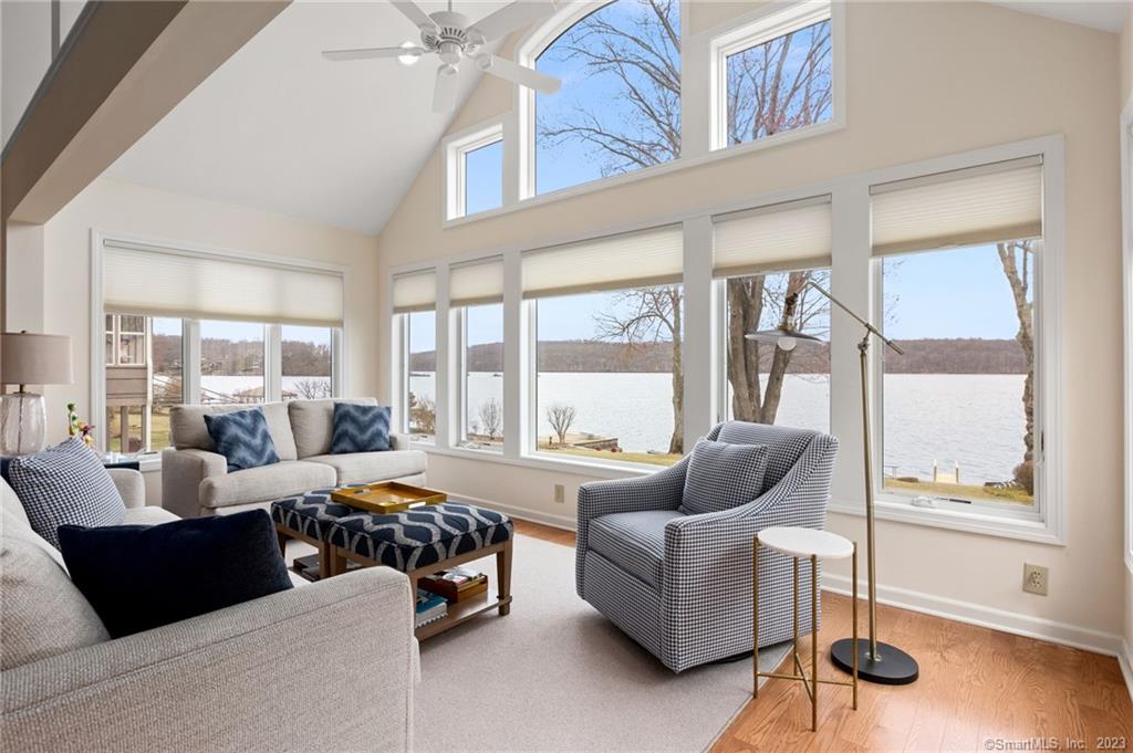 Direct waterfront on Candlewood Lake, New England's hidden treasure. Available April, May and June for $8, 000/mo or August-price available upon request. Also available during the academic season for $4500 per month. Flexible short term summer weekly as well. Just a short level walk to the water to enjoy swimming, boating, fishing, kayaking, water skiing, tubing, paddle boarding or hanging out on your private dock. Walk in and say, Wow to the light and bright great room with a wall of glass offering sparkling water views! An expansive island with seating in the fully stocked kitchen is crowned by a soaring ceiling giving it a light and airy feel. Primary bedroom with full bath on main floor as well as a full size washer and dryer. Two bedrooms share a full bath upstairs with a loft/game room. Barbecue on the patio or simply stargaze at night. Includes 2 paddle boards and water toys. Bring your boat or inquire about rentals. The perfect summer or year round escape! Ample off street parking. 90 minutes to NYC. Restaurants for dining or local shopping in nearby quaint New Fairfield. Not available the first two weeks of August.