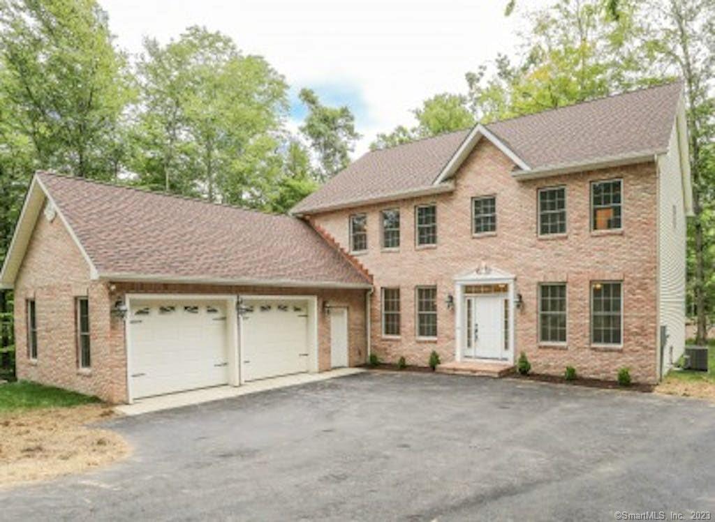 WELCOME TO 9 BUCK MOUNTAIN COURT! This 4 bedroom custom colonial built in 2015 is located in the prestigious Warwick Estates cul-de-sac neighborhood. Once inside, you are greeted by 9'0 main level ceilings and beautiful oak hardwood floors throughout. The main level has a family room, living room, dining room, chef's kitchen including granite countertops, stainless steel appliances, and two built-in ovens. The family room features a striking floor to ceiling fireplace, and oversized windows to admire the stunning evening sunset. Master bedroom suite encompasses a large walk-in closet and the master bathroom is equipped with a large walk-in shower, free-standing tub, and double vanity. Finished basement with extra bedroom, full bath, large family and fitness rooms. Two brick patios. Outdoor brick fireplace. Home also offers a 2 car attached garage, mud room, full size backup power generator, crown moldings, central AC and high efficiency spray foam insulation, and ADP security system. Located on 2.27 acres with beautiful landscaping and wooded areas.Conveniently located close to town, Candlewood Lake, and the NY border/Metro North. A great opportunity to own a newer build!