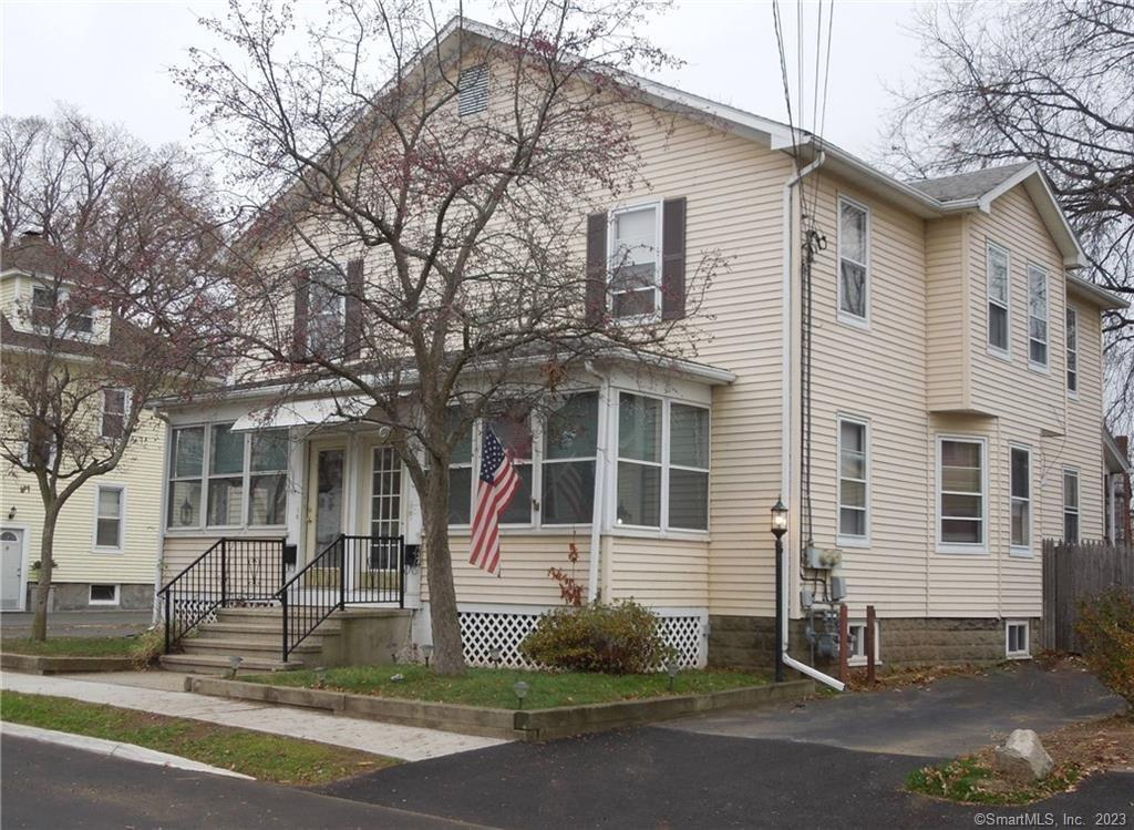 This remodeled duplex is move-in ready and offers a great open floor plan with a spacious living room and dining room featuring bright bow windows. The kitchen has been renovated with gray cabinetry, quartz countertops, gas stove, center island with breakfast bar, and a sizable pantry. The first floor has a half bathroom, and upstairs, there is a remodeled bathroom and three bedrooms, with the primary bedroom featuring a walk-in closet. Enjoy the changing seasons from the lovely enclosed front porch. The home also includes a full basement, separate utilities, gas heat, laundry hook-ups, and a privately fenced backyard. Tenants are responsible for all utilities, including the sewer usage fee, rental insurance, and credit check.