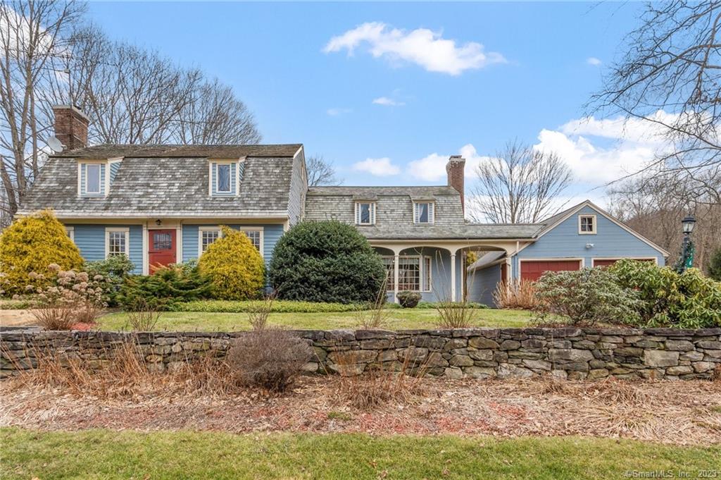 Welcome to this 4 bedroom, 2 bath Cape Ann Colonial on Windham Center Road! Built in the 1700s, this home offers a historic style and boasts over 2, 600 square feet of living space. Folks will appreciate the rustic touches in the home, including wide plank hardwood floors, custom built-ins, and multiple fireplaces. Along with the kitchen, full bath, and laundry, the main level includes large spaces for gathering with friends and family, including the living room, study, family room, and a large dining room with lots of natural light. Upstairs you'll find 4 bedrooms, all with hardwood flooring and tall ceilings that allow for full utilization of the upstairs space. The upstairs full bathroom conveniently offers two sinks. Outside, there is a private patio and backyard space that was professionally landscaped by the previous owners. The left side of the house was added on in the 1950s on a concrete foundation. A new septic system was installed in 2021, and the garage roof was replaced with asphalt shingles approximately one year ago. Located only 10 minutes away from Route 6. Stop by and see what this home has to offer!