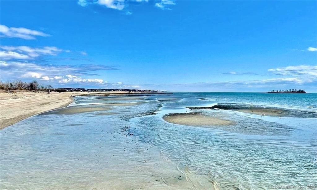 Here's your chance to build a new construction home directly on the sand in desirable Walnut Beach location on a 50 wide frontage lot. Owner has plans and approvals for up to a 4300 sq ft house ready shown in photos or design your own home. You can build smaller. Price is for lot only. The only direct waterfront lot available in town. Live the life you have always dreamed of with views of Charles Island, the boardwalk leading to Silver Sands state park, eateries and Scoot and Paddle where you can rent a kayak. Enjoy bands on summer weekends at Walnut Beach. Your new life awaits you! Buyer to do own due diligence and seller and/or agent make no warranties.