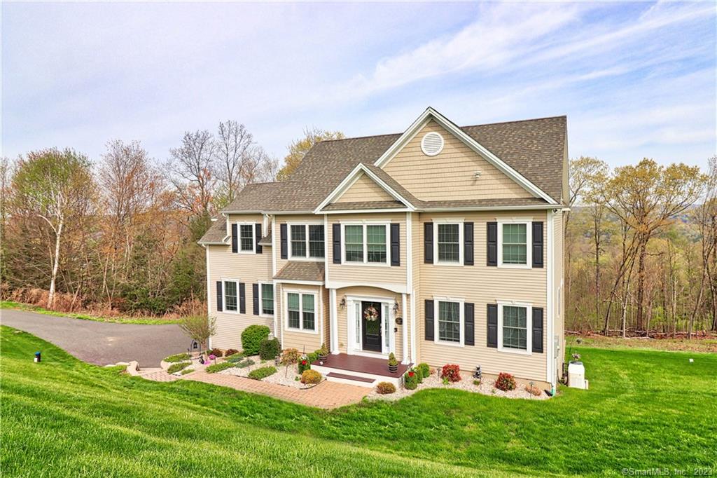 Welcome to 251 Valley Stream Lane! Situated on a 4-acre lot at the end of a cul-de-sac, this beautiful home offers the perfect blend of privacy and luxury.As you step inside, you'll be greeted by a warm and inviting sitting room that's perfect for relaxing with family and friends. The formal dining room is ideal for hosting dinner parties and holiday gatherings, while the spacious eat-in kitchen provides plenty of room for casual meals. The living room is a true highlight of this home, featuring a cozy fireplace, a sound bar, and a mounted TV. It's the perfect place to unwind after a long day. With 4 bedrooms and 3.5 baths, this home offers ample space for families of all sizes. The primary bedroom is a true retreat, complete with a full bath featuring a double sink, a huge dressing room, a walk-in shower, and a separate bathtub. Each of the additional bedrooms has its own unique features and plenty of space. Downstairs, you'll find a cooking area, a sitting area, and possible living space that's perfect for an in-law apartment or entertaining guests. The basement walks out to a beautiful patio and hot tub, making it easy to enjoy the outdoors in any weather. Additional features of this home include a convenient main-level laundry room and an overextended two-car garage that provides plenty of storage space.With its prime location, beautiful features, and ample space, this unique home is truly a must-see. Don't miss your chance to make it your own!