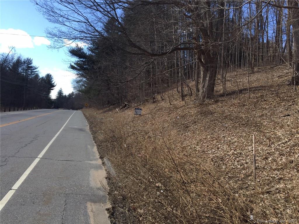 .49 acres on East Street (Rt 19). About 300 feet of road frontage. Public Sewer at Street. Applications to CT DOT are in process for driveway approval. Applications are in process for Building Variances from Stafford ZBA. Acreage across the street on Furnace Brook available.