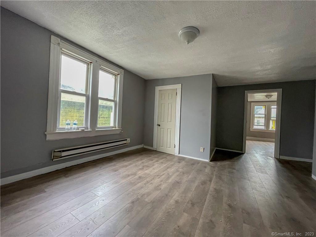 Fully updated 2 Bedroom apartment now available. Brand new Floors installed throughout, brand new kitchen, new bathroom, freshly painted. Property also has a large backyard plenty of on Street parking. Conveniently located to the Mall and shops this apartment will not last long schedule a private tour today.