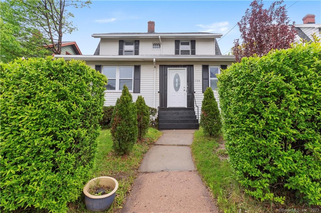 Welcome to this elegant 3 bedroom, 2.5 bathroom Colonial. This newly renovated property is situated on a quiet street in Hartford with convenient access to the Berlin Turnpike. It has a wonderful 728 sq ft finished lower level with space suitable as an additional bedroom with a half bath located on the same level! As you walk into this lovely home the kitchen features custom cabinetry, stainless steel appliances, and stone granite countertops, making it any cook's dream. The dining room has a charming built in cabinet and the gleaming hardwood floors lead you to into the living room with a cozy fireplace. Upstairs are your three main bedrooms and a second full bathroom which offers ample space for your family or guests. It also features an enclosed balcony that you can use all year long. The property includes a 2 car detached garage large enough for storage and the driveway is long and is able to accommodate additional cars.