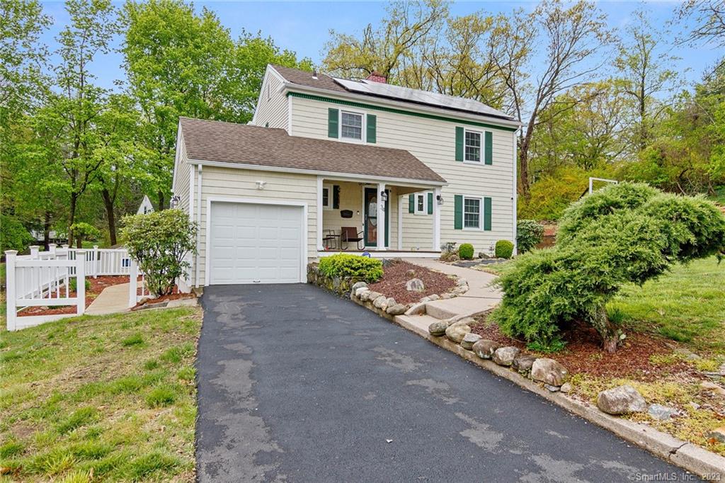 This beautiful Colonial is set right in the Allingtown neighorhood of West Haven. Minutes away from Downtown New Haven and Yale Golf Course. The amenities are endless in this home, 3 bedrooms and 2.5 baths, sunroom, attached garage, a newly renovated first floor with an open concept and new kitchen with stainless steel appliances. You will find hardwood floors through out the entire house. Ductless central AC units which also provide heat and Active Solar panels installed on the roof that have been known to cut homeowners utilies by half. The backyard is built for entertaining, sliding doors from the kitchen lead to a large deck and walk directly to above ground pool, a fire pit and stoned patio with a pavilion greet you on the other side of the yard along with a second drive way with a 6 car capacity. This colonial has it all and is move in ready!