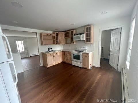 Impeccably maintained and updated 3 bedroom, 1.5 bath, townhouse style duplex. Located on quiet one way street with a back yard. Tenant is responsible for heat, hot water and electricity. No smoking or pets allowed. 2 months security, background check and proof of income is required. Tenant is responsible for application and credit check fee.