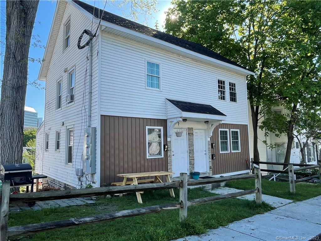 Great investment - property located within walking distance to University, Hospital, etc - This 3 family building was remodeled in 2016 - Tankless hot water and heat combo gas unit, roof, windows.... easy maintenance - This 3 family is being sold together with building lot for one family home on 4-6 Elwell Place....23 Griffing and 4-6 Elwell are connected in the back - Drive way for single family has been started - Engineering has been done - Great opportunity here .