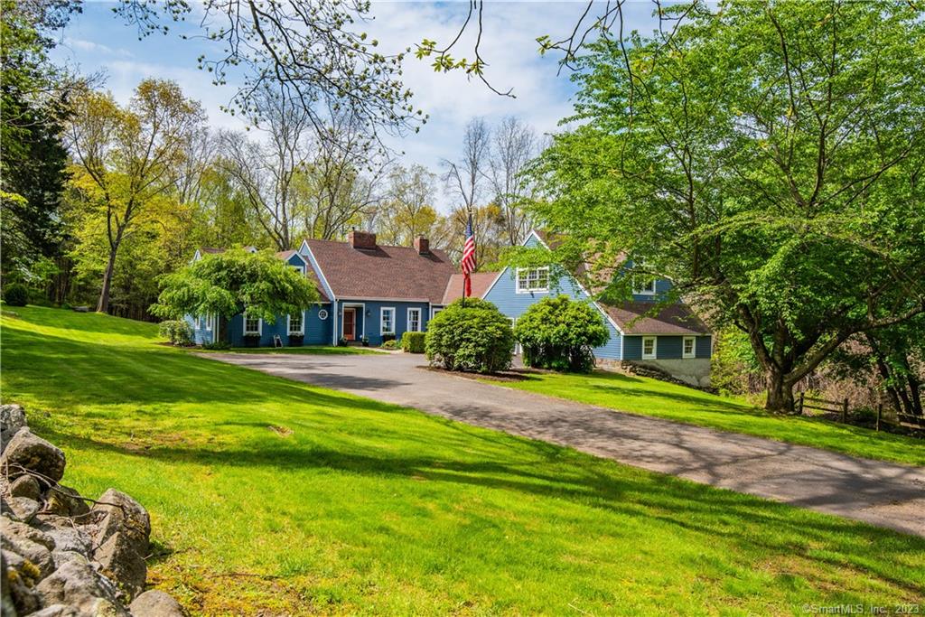 Classic Cape, with attention to details, hard wood flooring, 3 Fireplaces flanked w/ builtins and pretty mantles. Primary suite on main level (w pellet stove), walk in and full bath. Two full baths on mail level, 2 on upper. Formal living and dining rooms, and beautiful family room that opens to 16x16 screened porch. Huge Fifth bedroom over the 3 car garage utilizes back staircase off mud room & full bath area is currently used as an office. Charming and very private on 4.19 acres. Super easy access to major routes for traveling or down into town in just minutes.  Home has 6 zones in total, the baseboard in the 5th BR/office is not working, they use the mini split only. 3 car garage, one bay has bump out for laundry in it so only small car or lawn tractors etc. 2 overhead openers. Duct work for A/C in the walls for first floor, in the attic for upper. Driveway perimeter lights and alarm connected to ADT. Generac generator runs everything except w/d and 5th BR.