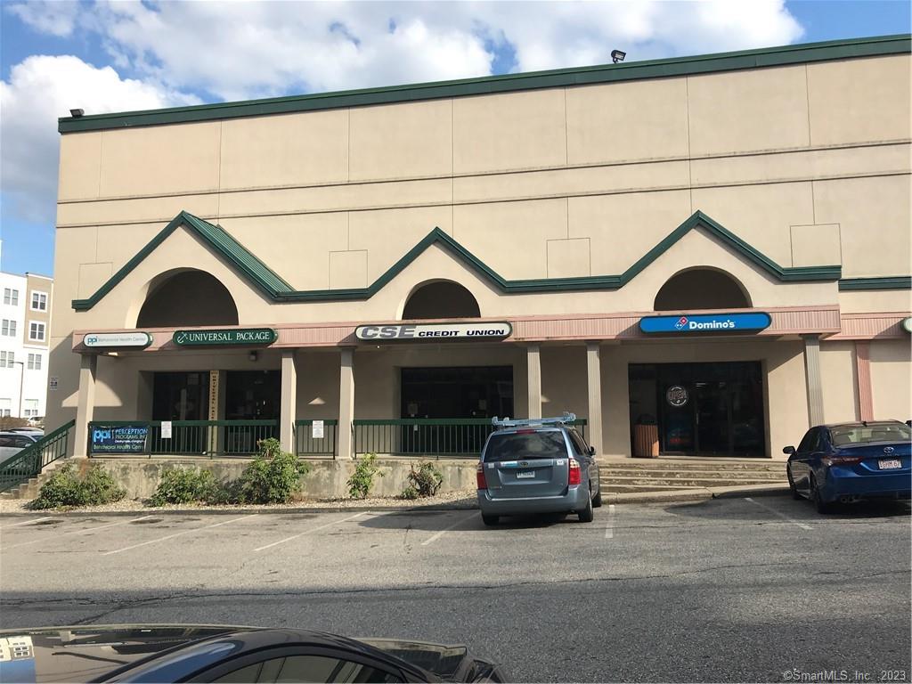 Prime Retail Location in the heart of Downtown UCONN Main shopping district. 1850sf retail/office/food space located in Storrs Commons, directly across the street from E.O. Smith High School and UCONN. The unit is on on the NE corner of the building with access on two sides. High visibility and pedestrian foot traffic. This location benefits from offsite parking lot with 3 ingress/egress. Park and walkup to the space. Other tenants include Starbucks, Hartford Hospital, M&T Bank,  Chang's Garden, and Domino's. Storrs Commons is wrapped on three sides by Storrs Center. Currently operating as a liquor store, business is not for sale. $35/sf/yr + NNN. Owner is licensed real estate broker.