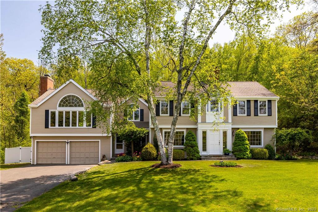 Lush sweeping lawn beautifully enhanced by manicured landscape beds, ornamental plantings, & flowering trees provides the perfect setting for this picturesque colonial on 5+ acres in sought after, convenient east side location.Offering wonderful space & a sunfilled interior w/classic style & hardwood floors on both levels.Natural light spills in through a beautiful oversized arch window to the inviting 22x20 family rm where gorgeous sunset views light up the sky as night falls.Step outside to expansive deck overlooking the level fenced yard & enjoy total privacy.An updated country kitchen w/granite island, SS appliances&breakfast nook offers a charming fireplace for cozy ambiance.Sunlight streams into the bright foyer of this center hall colonial w/generous front to back living room with pellet stove insert & formal Dr.A flex rm makes an ideal study and opens to a lovely patio.Upstairs the primary suite is a special retreat w/sitting rm, full bth, & wlk in closet.Two addl bdrms share upper level, one w/ensuite half bth, high ceiling & its own deck.Completing the upstairs is a full hall bth, cheerful laundry room, & walk up attic.Finished LL offers options for fun & games or a great work out space. Exterior & interior painted 2023.Avon mountain location close to shopping, dining, medical centers, award winning schools and outdoor recreation.Brimming with curb appeal and wonderful space to gather and entertain both inside and out! New A/C condenser being installed.